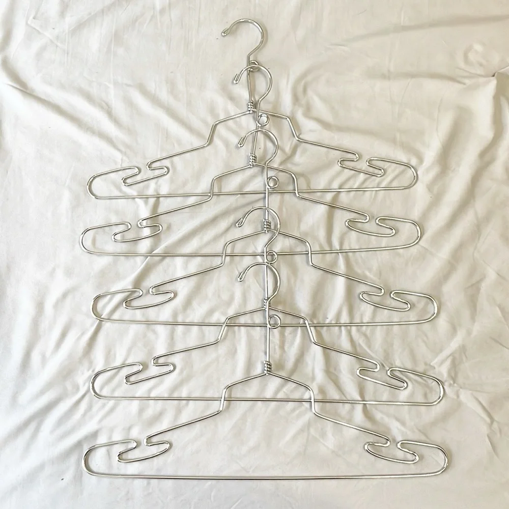 Set of 5 silver stainless steel top hangers for clothes